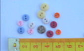 Assorted buttons including decorative when available.